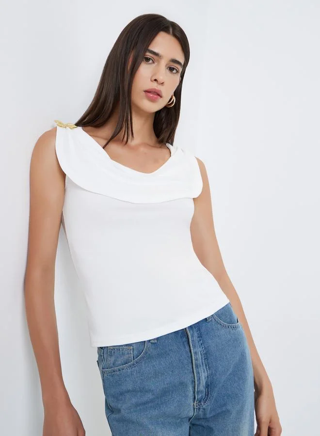 Styli Styli White Sleeveless Top with Butterfly Metal Accent