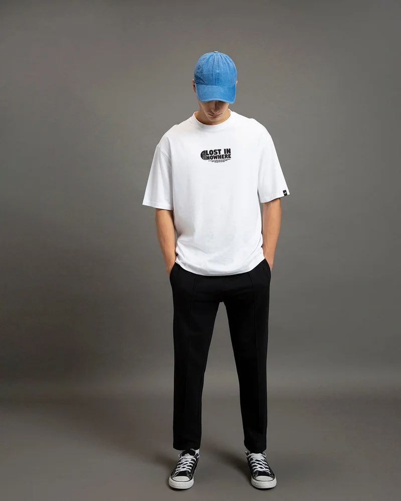bewakoof  Men's White Lost in Nowhere Graphic Printed Oversized T-shirt  | Best Price UAE