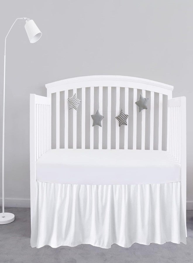 SKY BEDDINGS تنورة سرير مهد بيضاء 28" × 52" مع انخفاض 14" - تنورة مهد مزخرفة مع زوايا مقسومة - تنورة سرير ناعمة لمهد الأطفال القياسي للأولاد أو البنات - Image 1