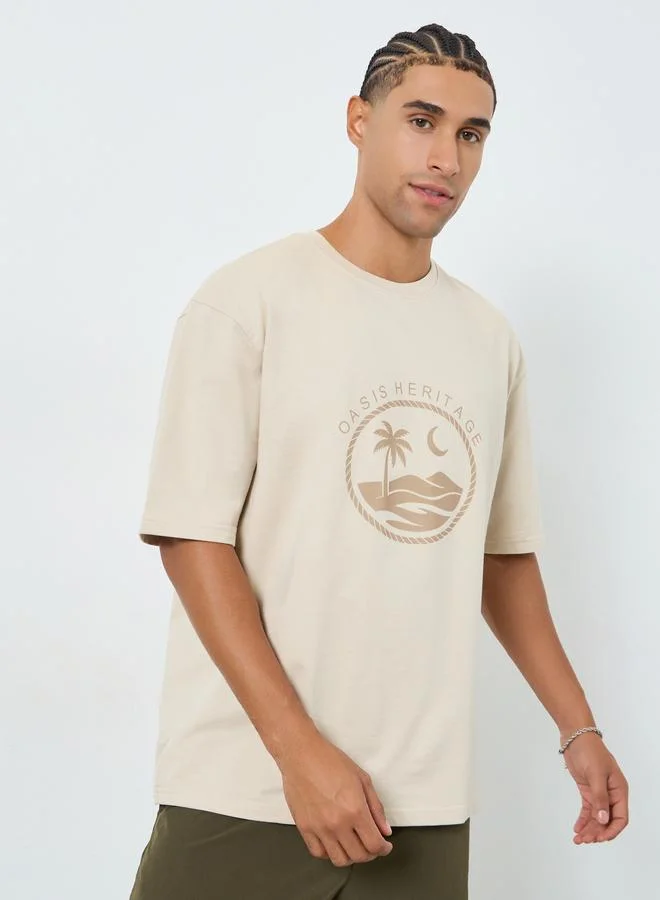 Styli Men Beige Graphic Print Oversized T-Shirt