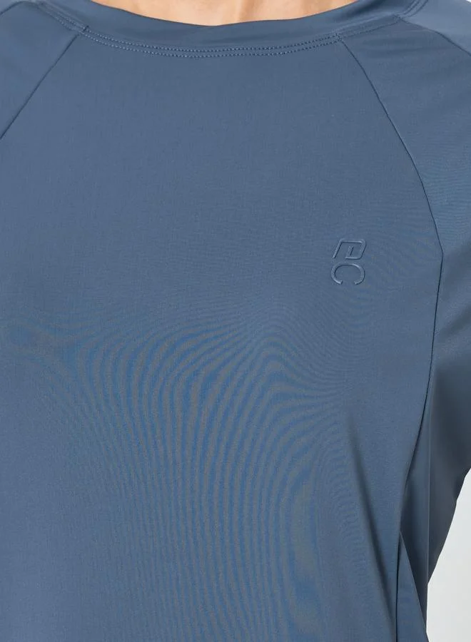 Styli Active  Women Rubber Logo Thumbhole Top for Women | Best Price UAE