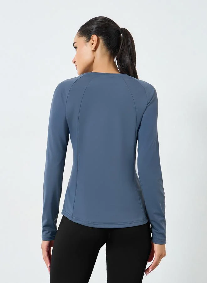 Styli Active  Women Rubber Logo Thumbhole Top for Women | Best Price UAE