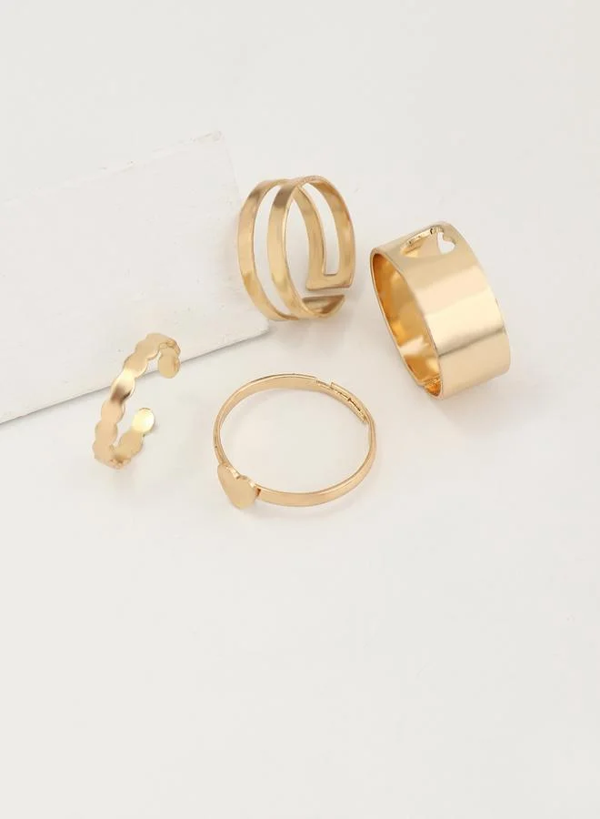 تايك تو طقم من 4 خواتم مفرغة بتصميم القلب