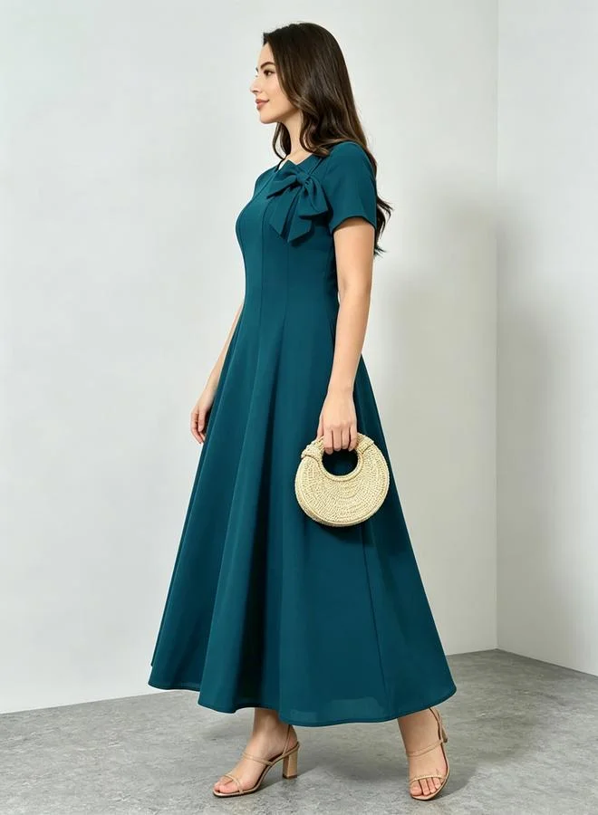 Styli  Blue Bow Detail A-Line Midi Dress for Women | Best Price UAE