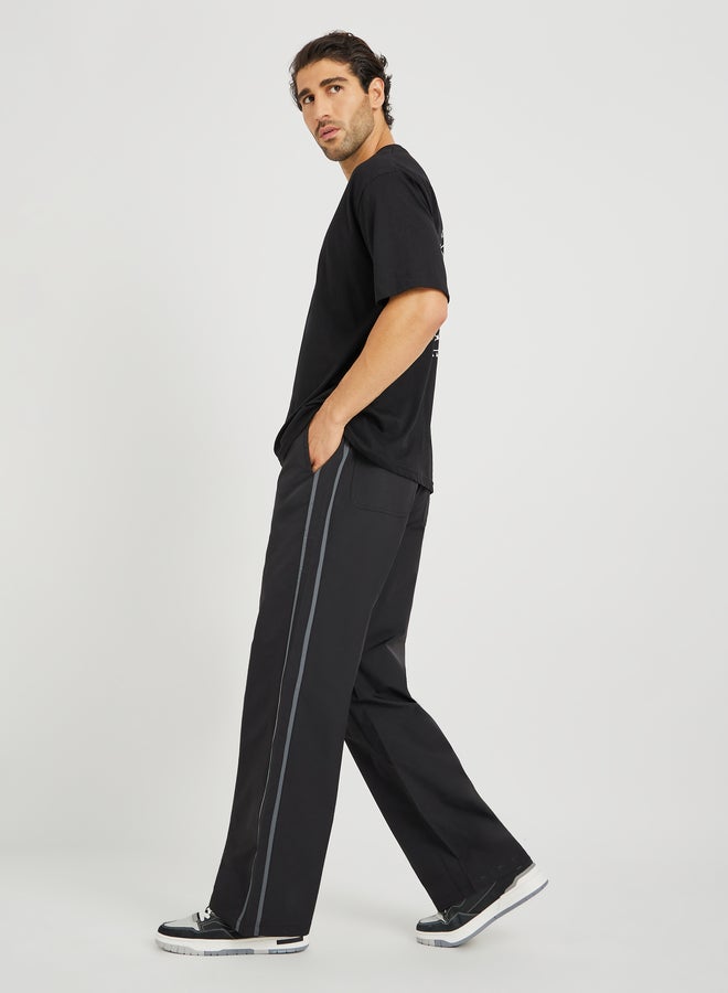 ستايلي جوجرز واسعة بفتحة سفلية وشريط جانبي - Image 2