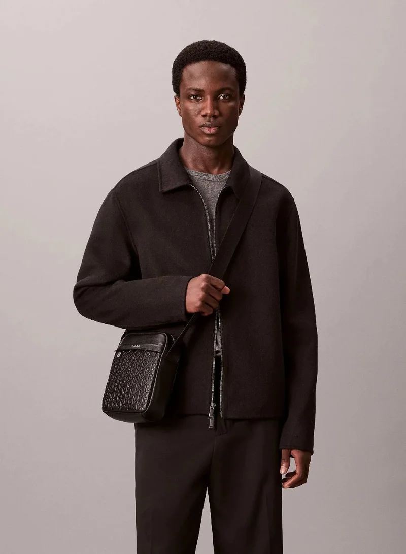 Calvin Klein Black Embossed Allover Monogram Reporter Bag for Men | Best Price UAE