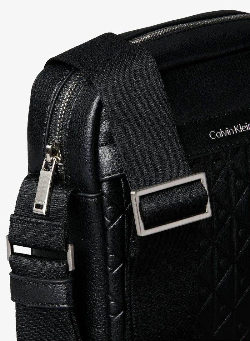 Calvin Klein Black Embossed Allover Monogram Reporter Bag for Men | Best Price UAE