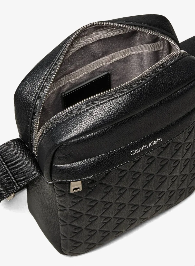 Calvin Klein Black Embossed Allover Monogram Reporter Bag for Men | Best Price UAE