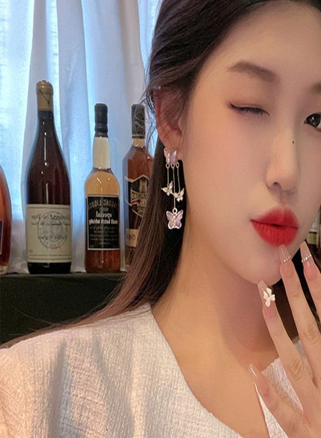 اتش تي اتش أقراط فراشة كريستالية للنساء من HTH، أقراط متدلية بشرابة مزينة بفراشات زركونيا مكعبة بنفسجية لطيفة (B، بنفسجي) - Image 3