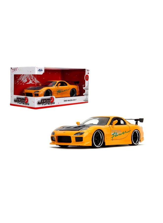 Jada Toys لعبة جادا تويز JDM تونرز 1:24 مقياس مصبوب 1993 مازدا RX-7 (FD) HKS، أبواب قابلة للفتح، داخلية مفصلة، إطارات مطاطية، قابلة للجمع للأعمار 8 وما فوق (أصفر برتقالي) - Image 1