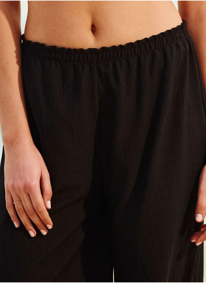 UNDIZ Wide-leg trousers