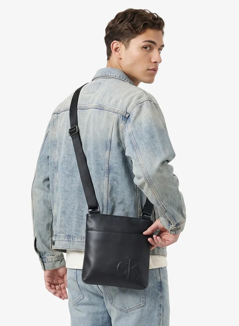 Calvin Klein Black Embossed CK Monogram Crossbody Bag for Men | Best Price UAE