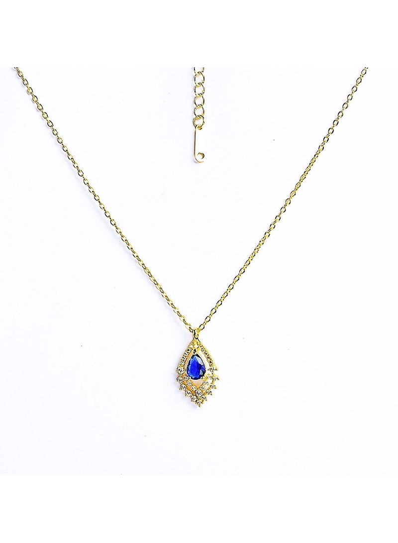 FLUFFY An elegant gold necklace with a luxurious design, featuring a radiant Colored gemstone surrounded by sparkling diamonds - Image 1