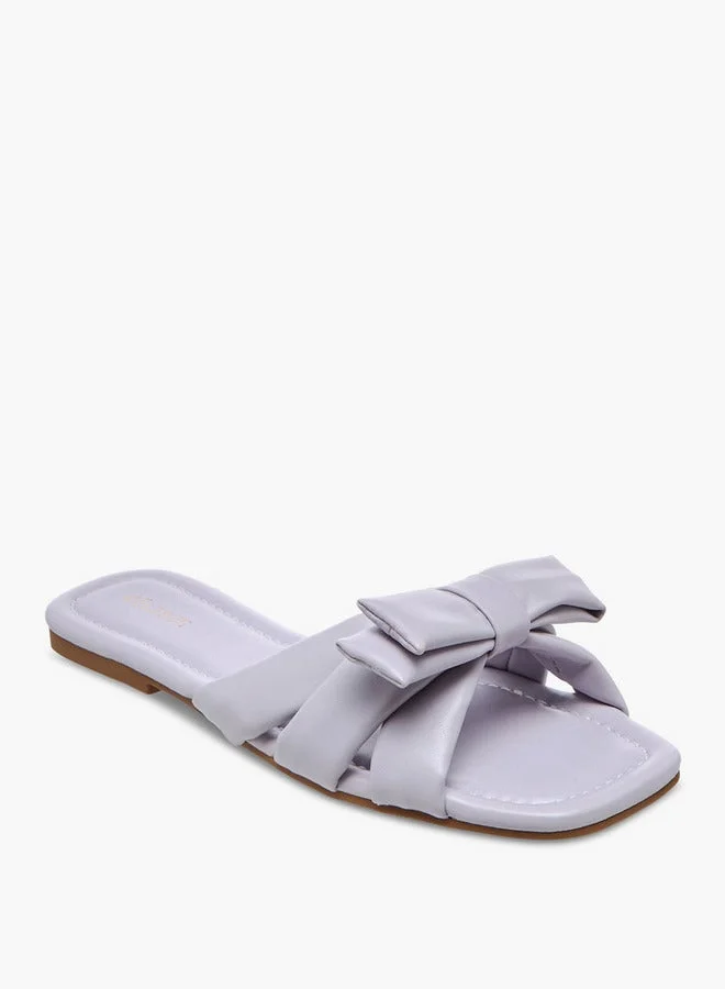 سيليست صنادل نسائية مسطحة سهلة الارتداء بتفاصيل فيونكة