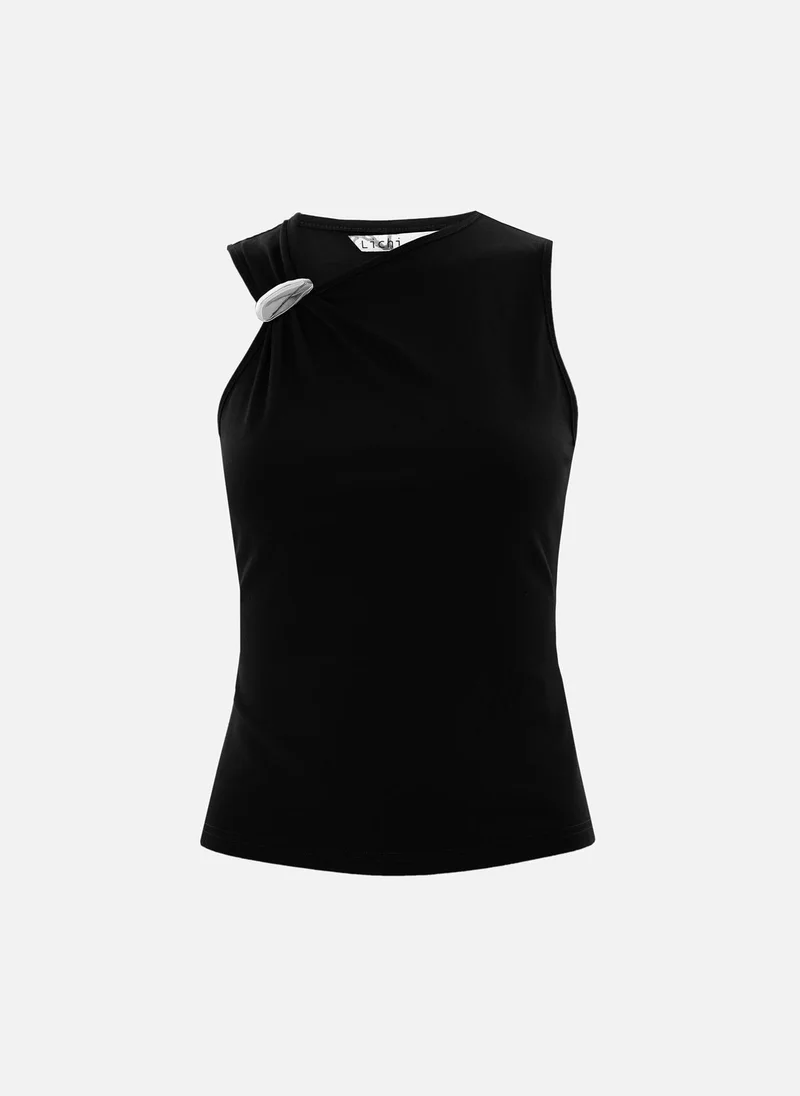 Lichi Top with asymmetrical straps and metal decorations