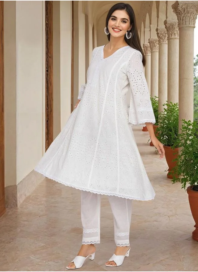 ISHIN Cotton Women Off White Cotton Kurta Set with Embroidered pattern Tunic and Palazzo features a Round neckline and Three-Fourth Sleeve secured with Elastic closure and styled in Straight Fit ideal for Festive moments — perfect for fashion-forward occasions.