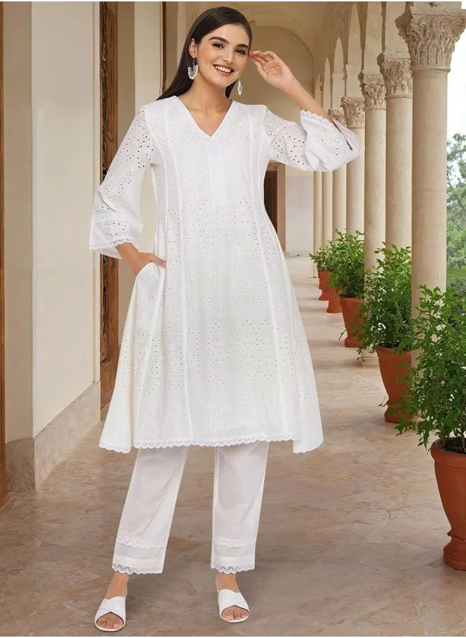 ISHIN Cotton Women Off White Cotton Kurta Set with Embroidered pattern Tunic and Palazzo features a Round neckline and Three-Fourth Sleeve secured with Elastic closure and styled in Straight Fit ideal for Festive moments — perfect for fashion-forward occasions.