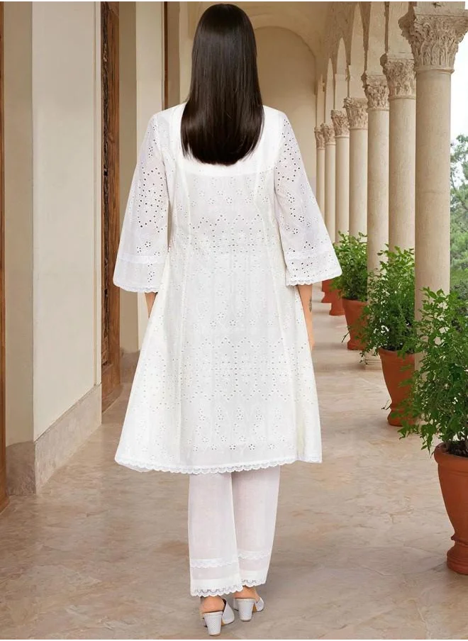 ISHIN Cotton Women Off White Cotton Kurta Set with Embroidered pattern Tunic and Palazzo features a Round neckline and Three-Fourth Sleeve secured with Elastic closure and styled in Straight Fit ideal for Festive moments — perfect for fashion-forward occasions.
