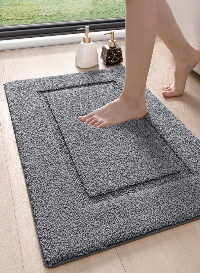 DEXI Bathroom Rugs 32x20, Washable Non Slip Bath Mat for Shower Floor, Absorbent Quick Dry Bathmat with Rubber Backing, Ultra Soft Plush Carpet for Tub, Grey - Image 1