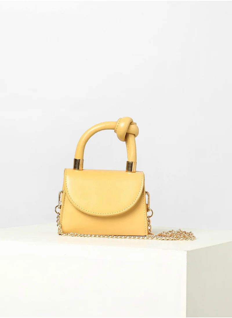 صوص هاوت Solid Yellow Handbag With A Flap