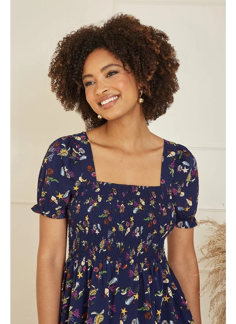 Yumi Printed Smocked Bodice Dress