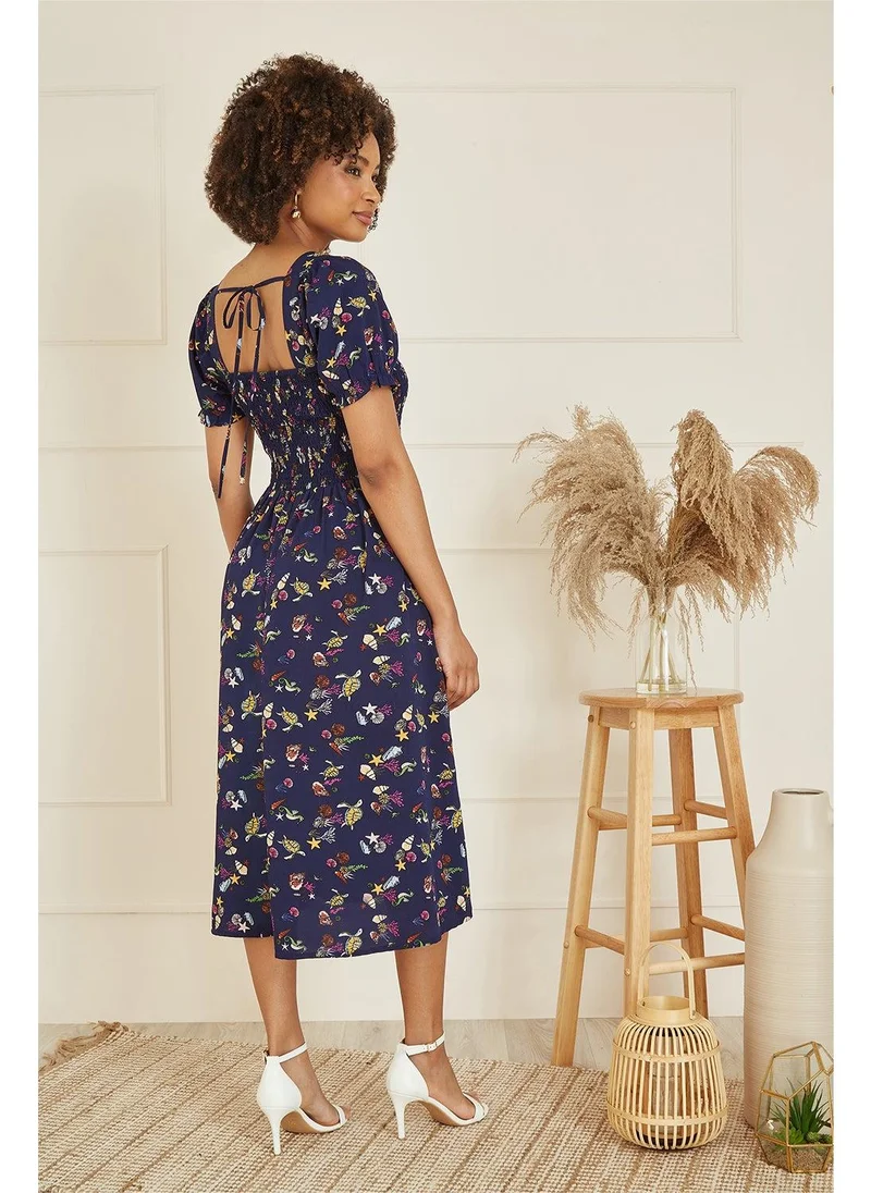 Yumi Printed Smocked Bodice Dress