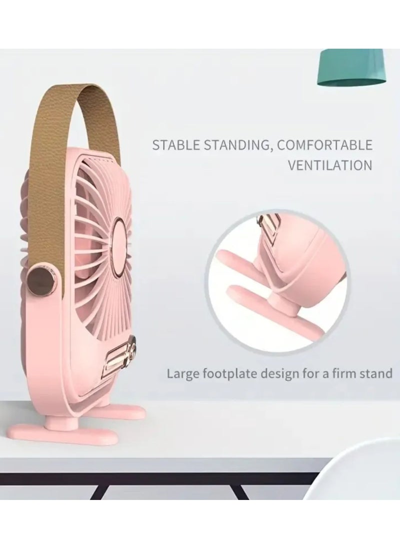 Desktop Mini Portable Electric Fan Plug-in Desktop Fan Is Holding A Small Fan