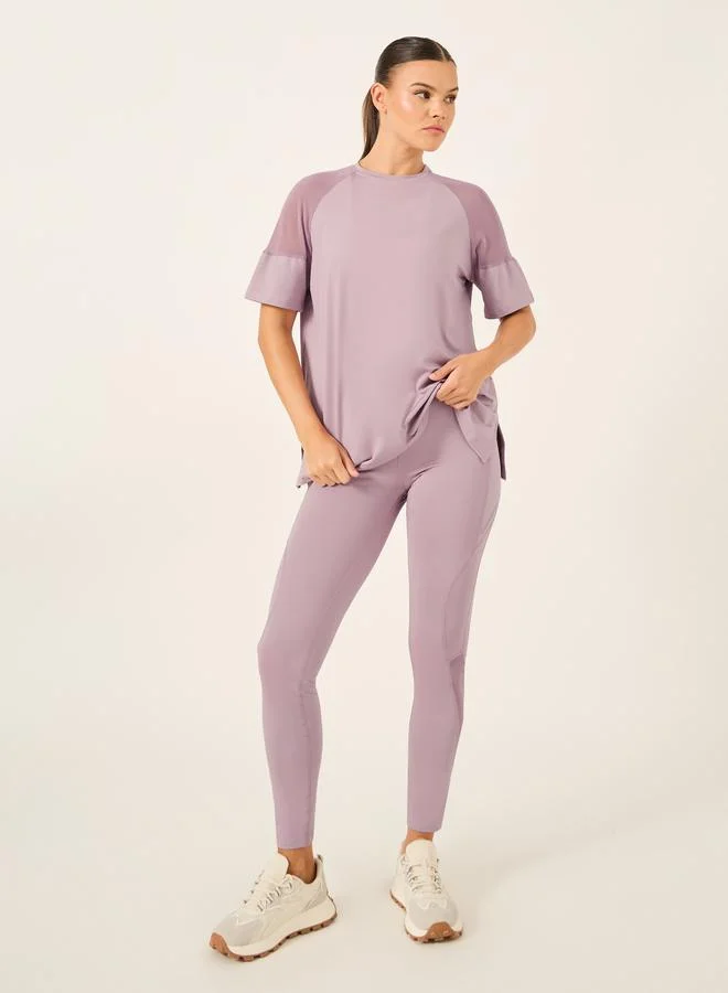 ستايلي اكتيف ستايل حزمة من 3 قطع - بلوزة بكتف شبكي، حمالة صدر رياضية بفتحة مزدوجة خلفية، وسروال ضيق