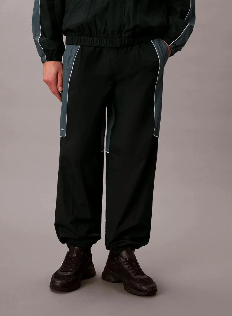 Calvin Klein Black / Turbulence Water-Resistant Travel Gym Trousers for Men | Best Price UAE