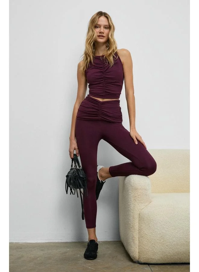Urban Beat  STRINVA Women's Stretchy and Soft-Textured Burgundy Leggings with Ruched Waist. for Women | Best Price UAE