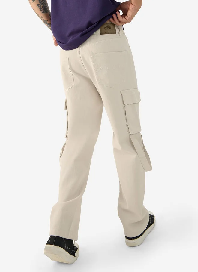 The Souled Store  The Souled Store Men Baggy Fit Solid Beige Cargo Jeans  | Best Price UAE