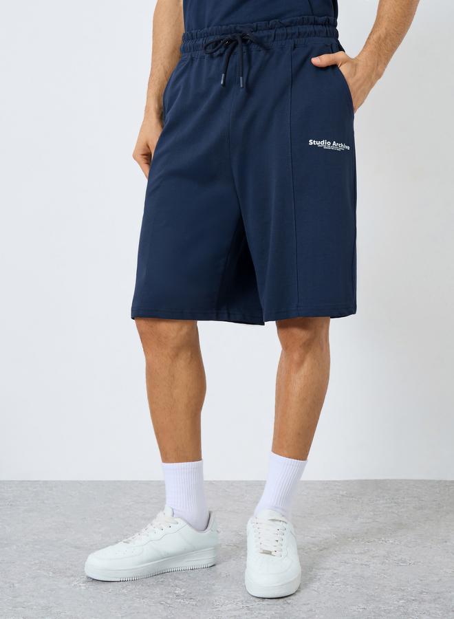 Styli Minimal Print Oversized Terry Shorts - Image 1