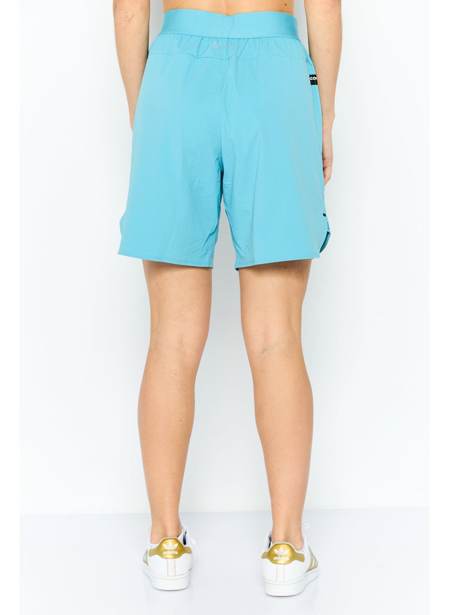 Adidas Women Sportswear Fit 7 Inseam Outdoors Short, Turquoise  - Image 2