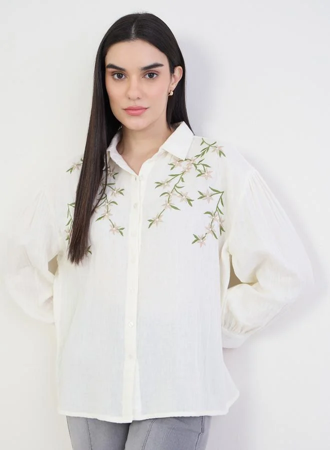 ستايلي قميص قطن مطرز بقصة واسعة
