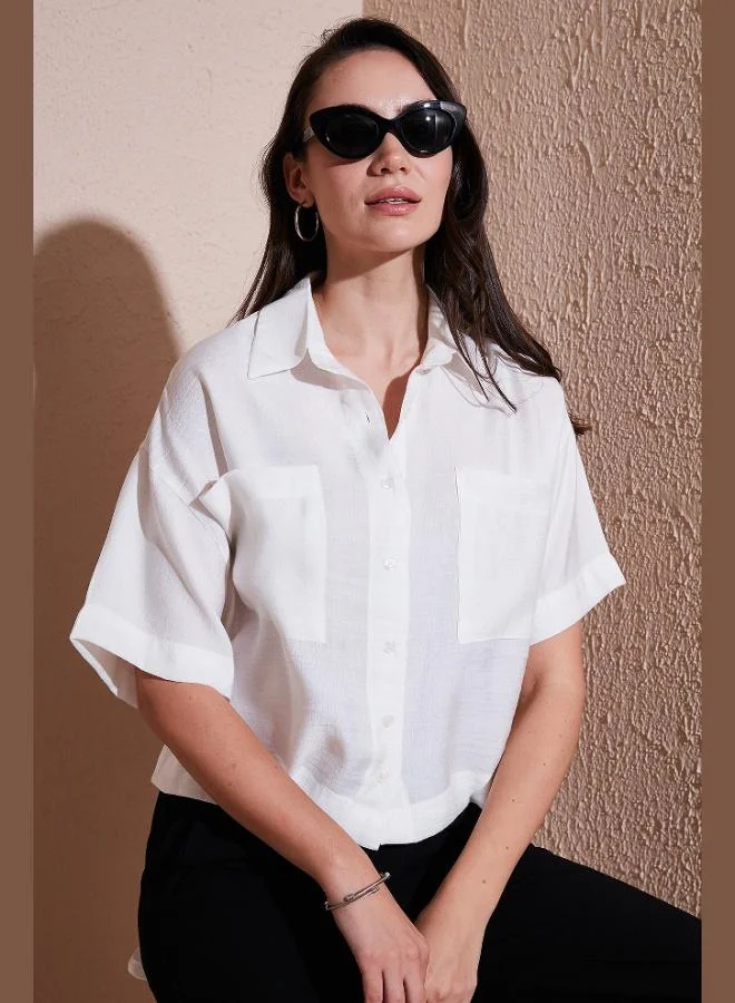 ليلا قميص نسائي بأكمام قصيرة وتفاصيل جيوب مقاس عادي