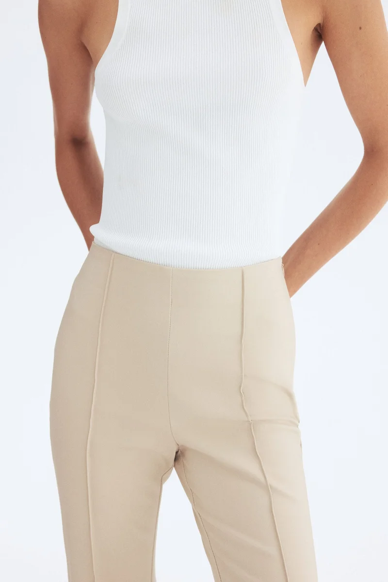 H&M Flared crease-front trousers