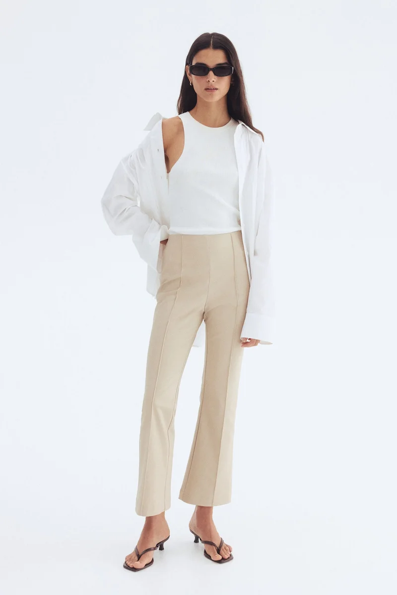 H&M Flared crease-front trousers