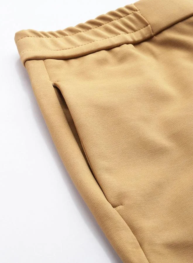The Indian Garage Co  Men Brown Relaxed Fit Chino Pants for Men | Best Price UAE