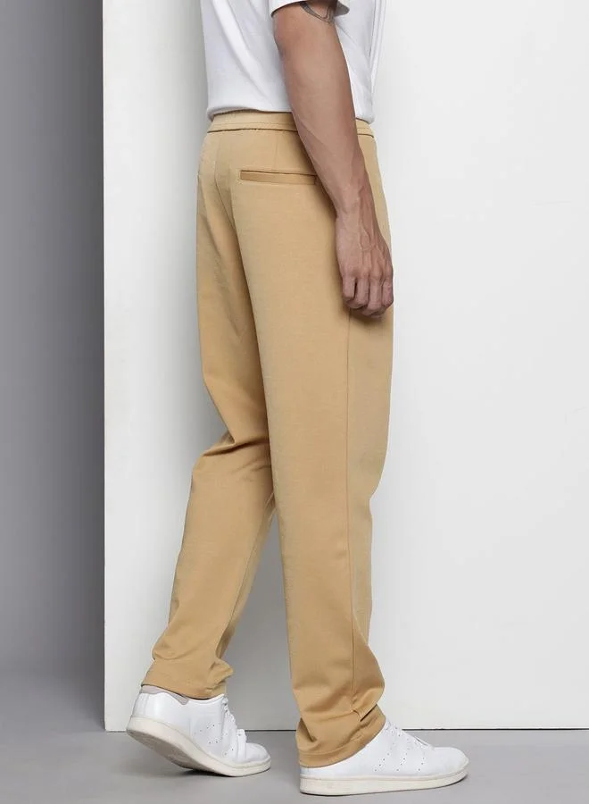 The Indian Garage Co  Men Brown Relaxed Fit Chino Pants for Men | Best Price UAE