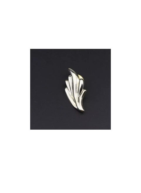 A luxurious fashion accessory pin with an elegant and distinctive design