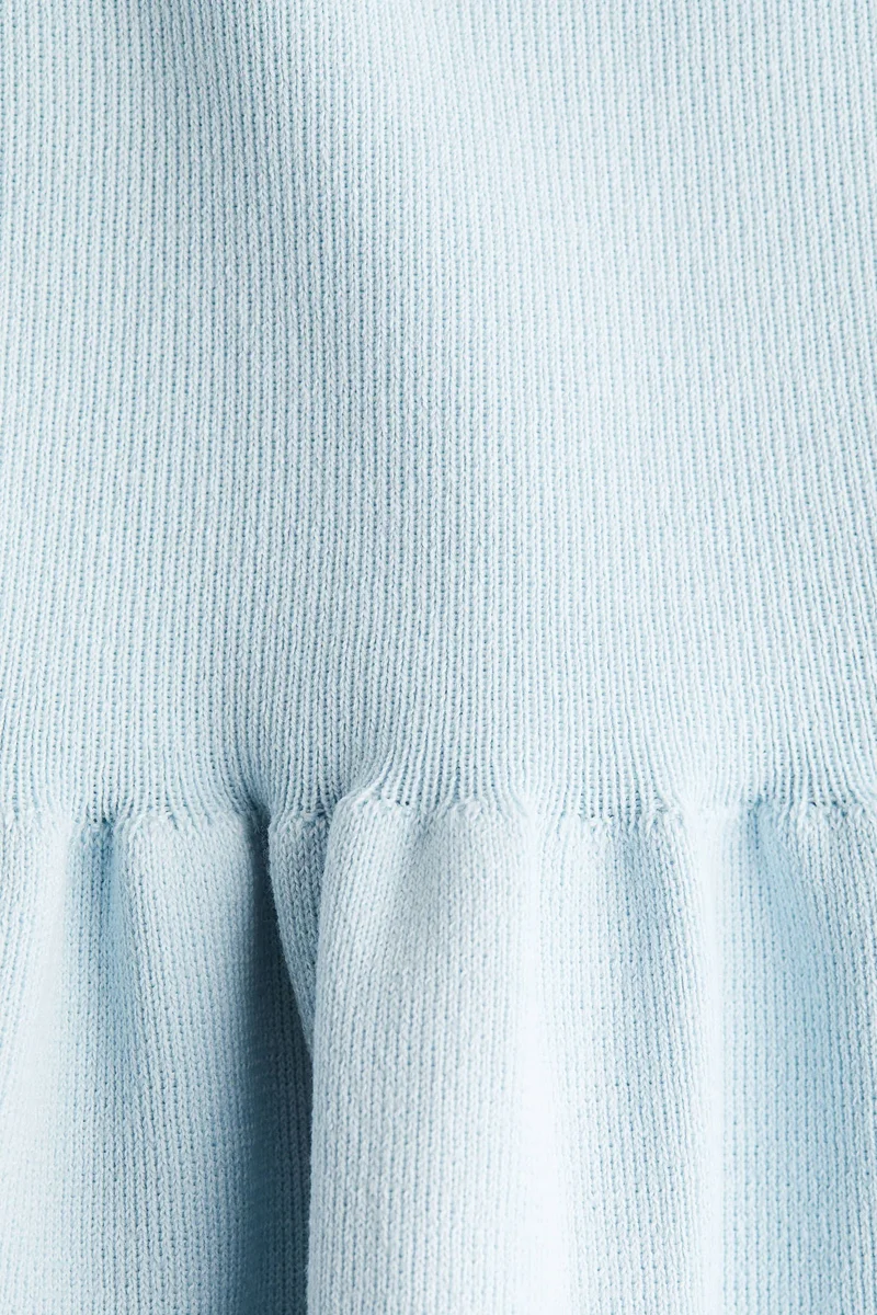 H&M Knitted peplum top