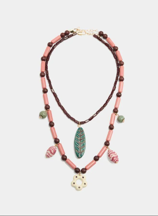 بارفوا مجموعة من القلائد مع السيراميك