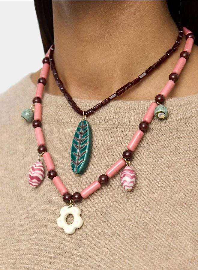 بارفوا مجموعة من القلائد مع السيراميك