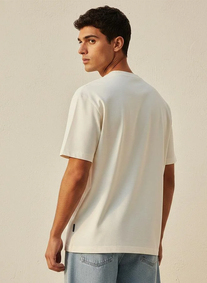 Lee Cooper Cream Lee Cooper Crew Neck Badge Applique T-shirt for Men | Best Price UAE