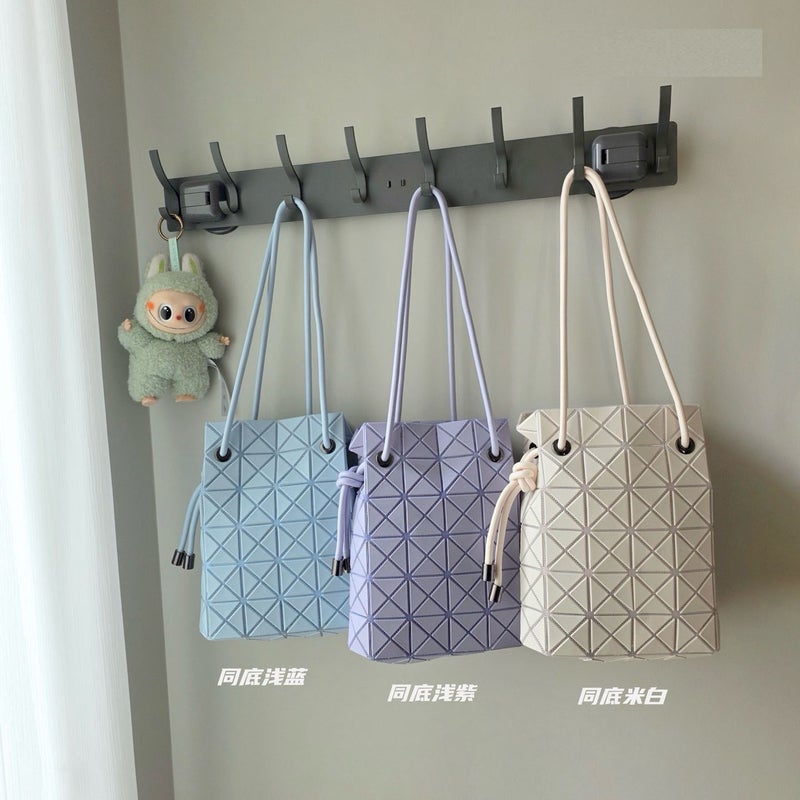 Women's Drawstring Bucket Bag with Quilted Pattern - Image 1