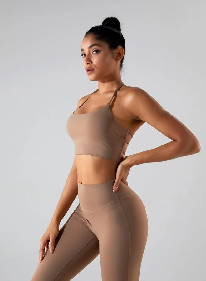 كون.يوغا حمالة صدر رياضية نسائية بدون أكمام مخططة من الخلف