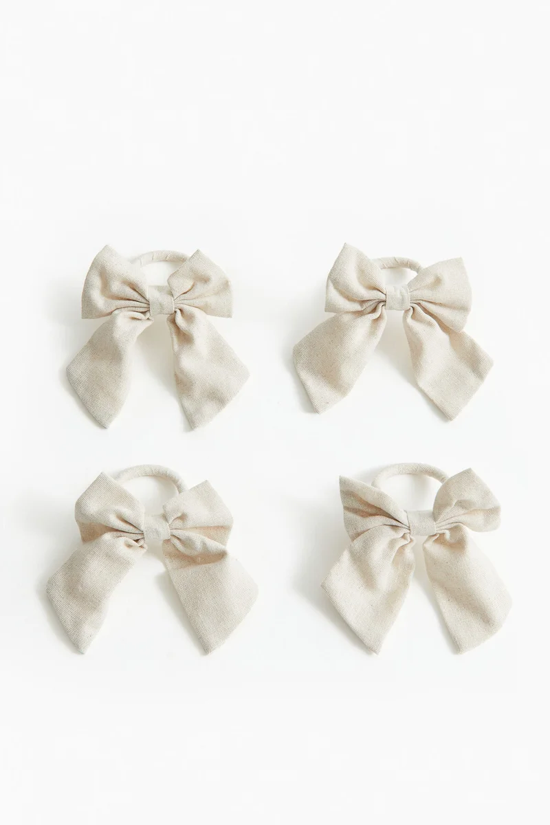 اتش اند ام 4-pack bow napkin rings