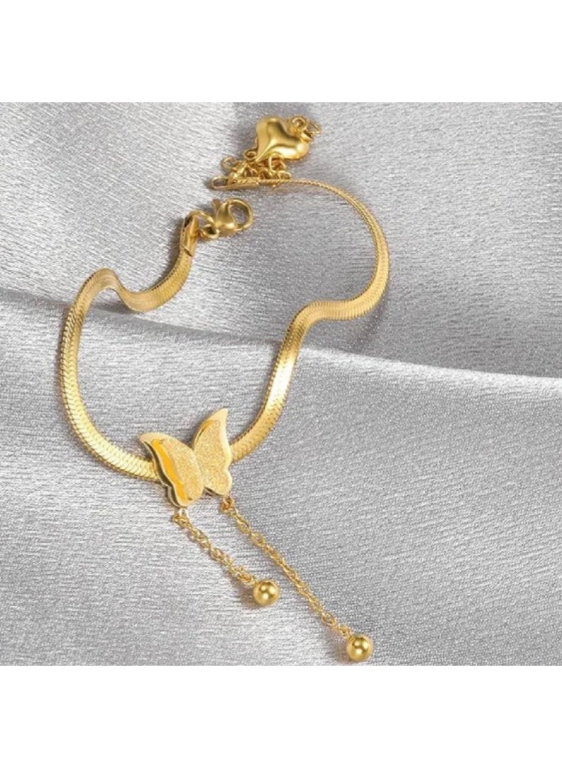 MANIKAN Gold Plated Butterfly Necklace with Dangling Ball Charms - Image 1