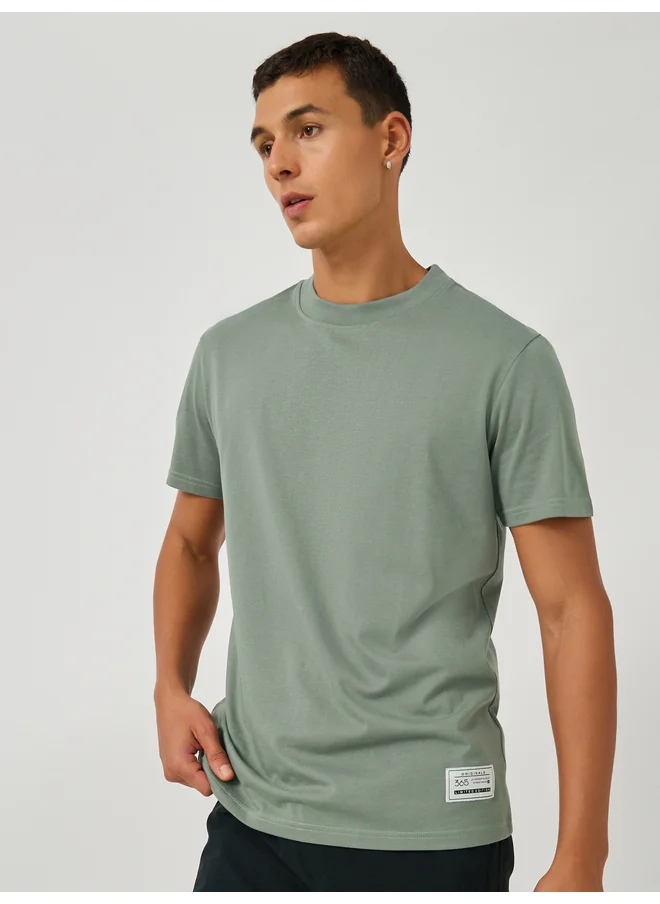 ستايلي Styli Badge Detail Mock Neck Regular Fit T-Shirt