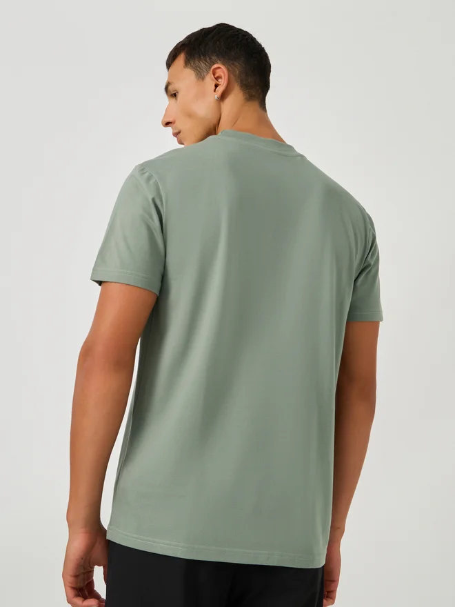 Styli Styli Badge Detail Mock Neck Regular Fit T-Shirt